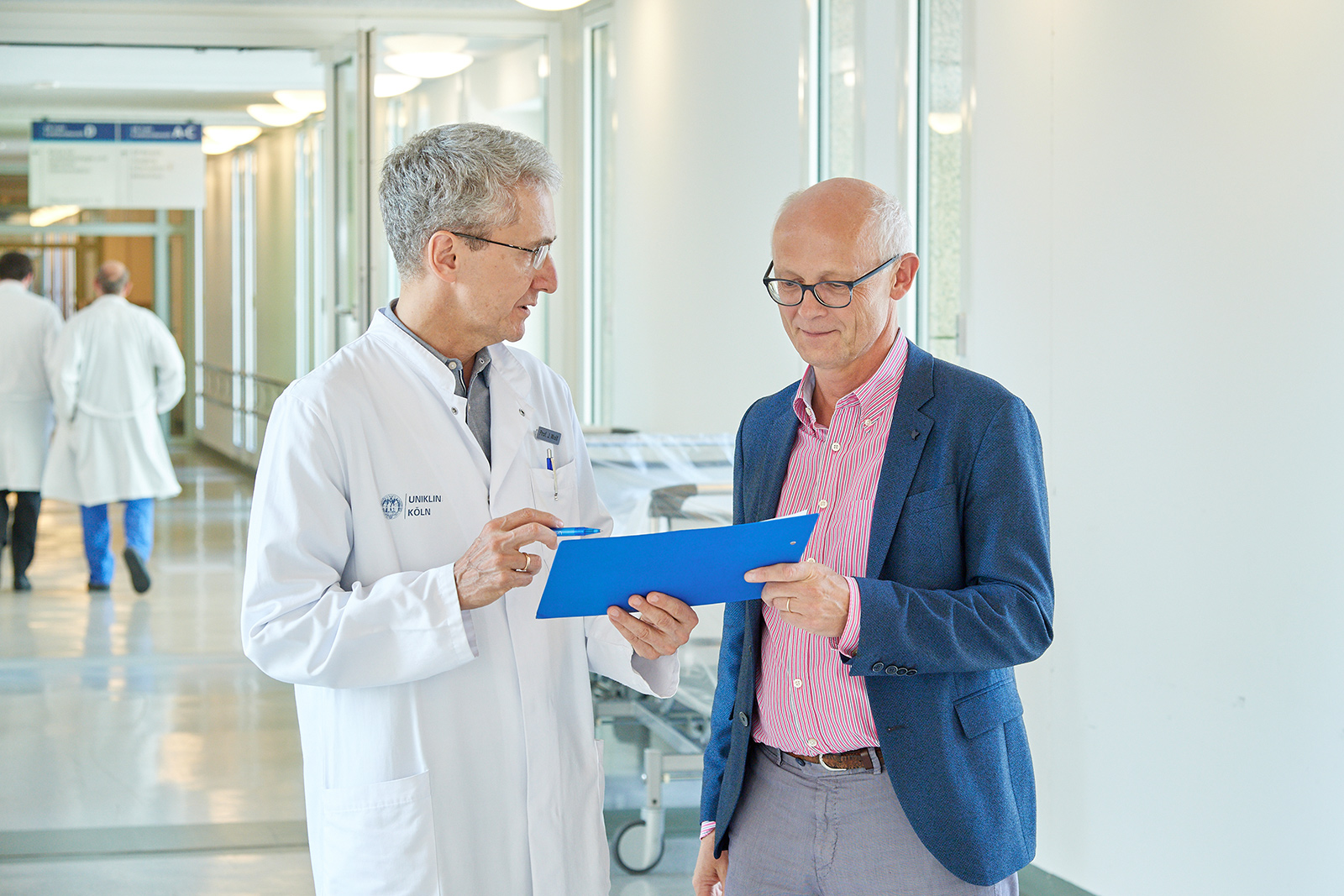 Prof. Dr. JÃ¼rgen Wolf and Prof. Dr. Reinhard BÃ¼ttner at University Hospital of Cologne